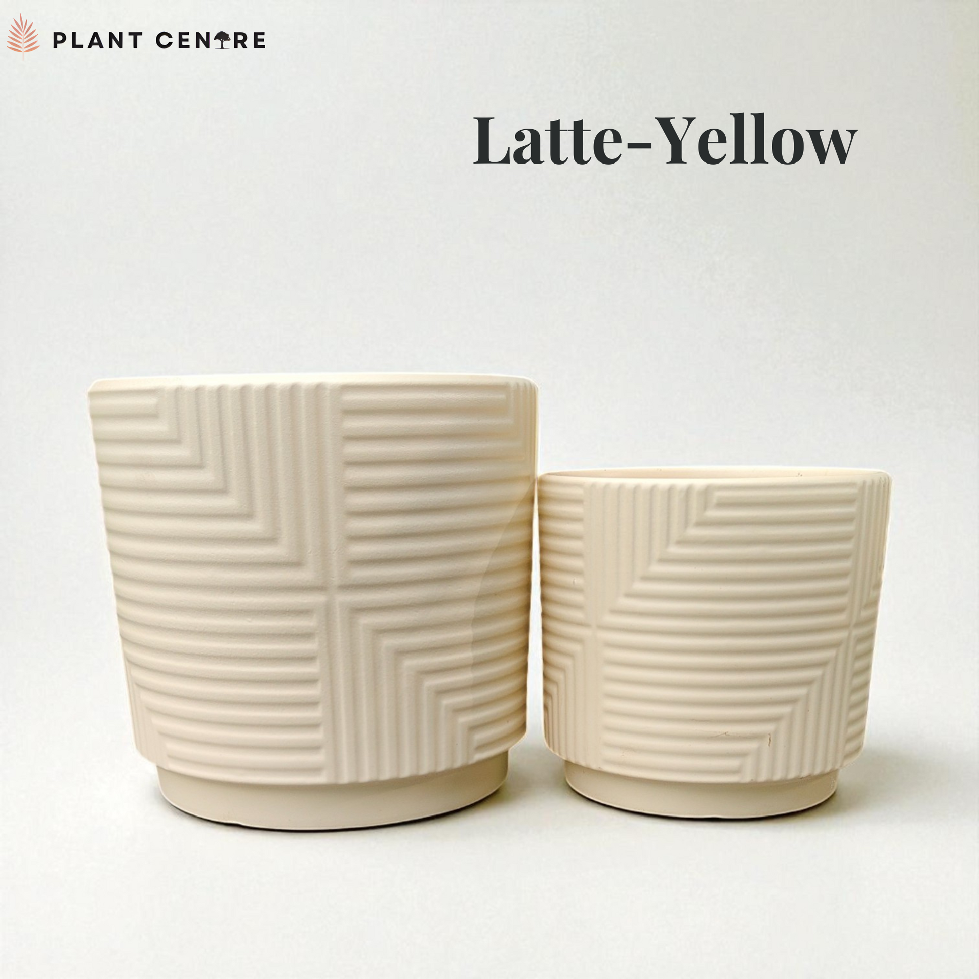 Two ceramic plant pots with geometric patterns on a white background, labeled 'Latte Yellow'.