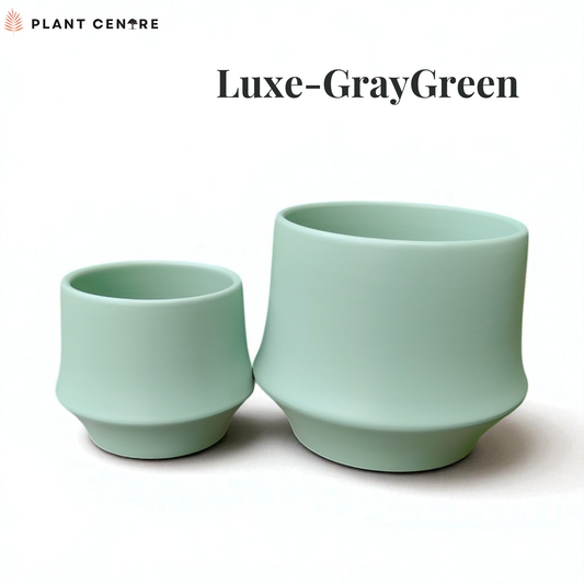 Two light green plant pots on a white background with 'Plant Centre' branding.